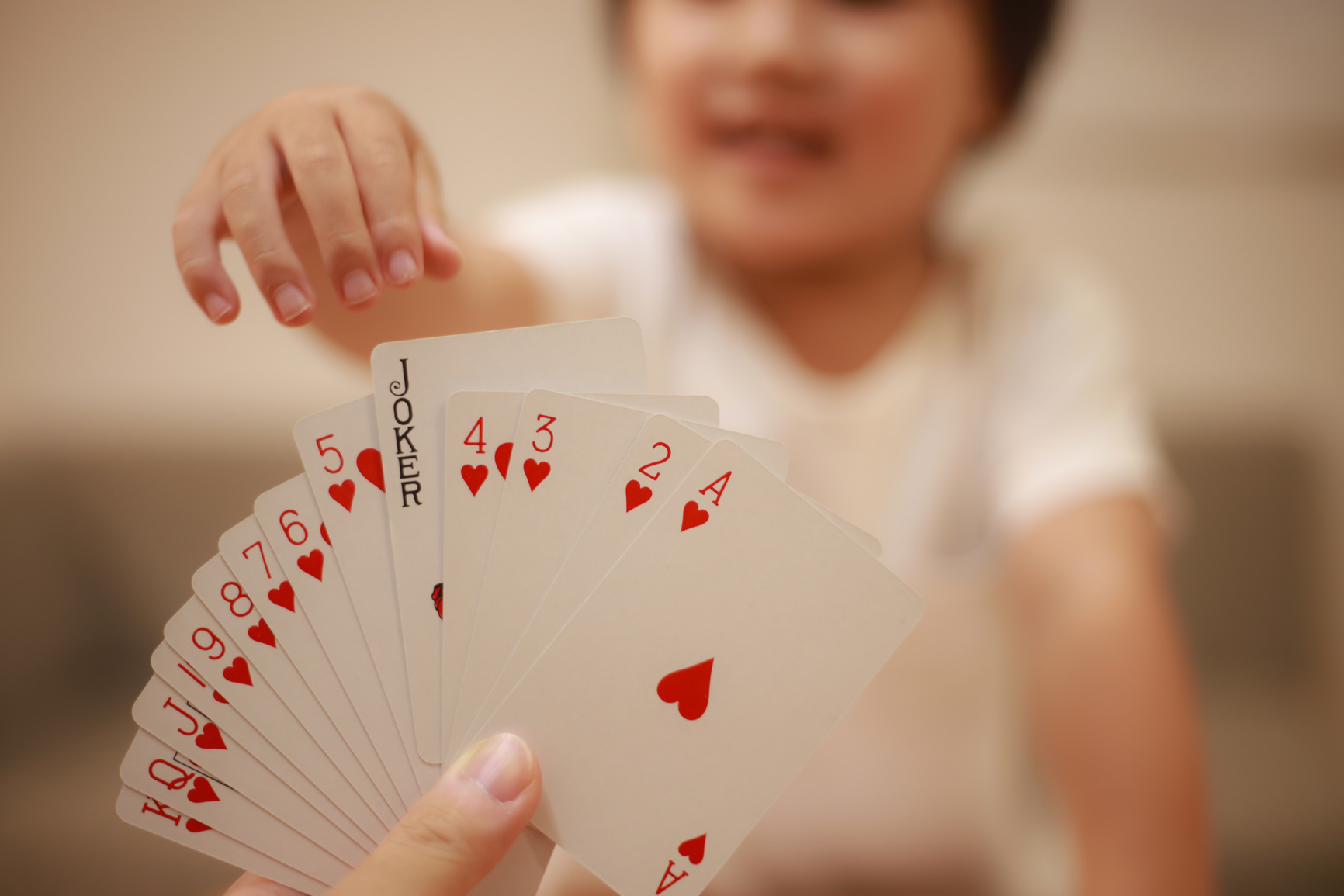 Boy playing cards